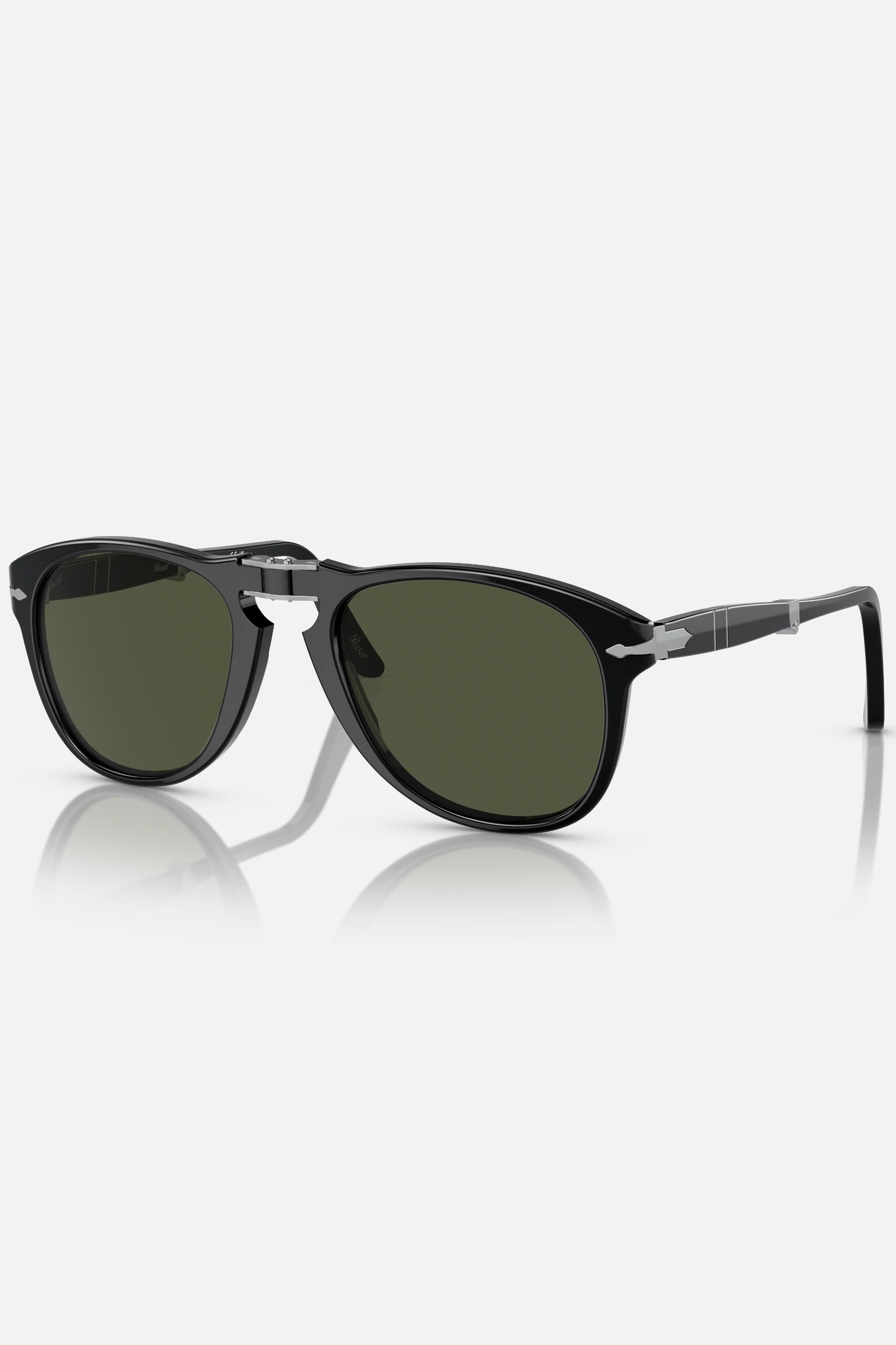 Occhiali da sole Persol PO714 95/31 neri con lenti verdi, modello folding misura 54-21, design vintage italiano.