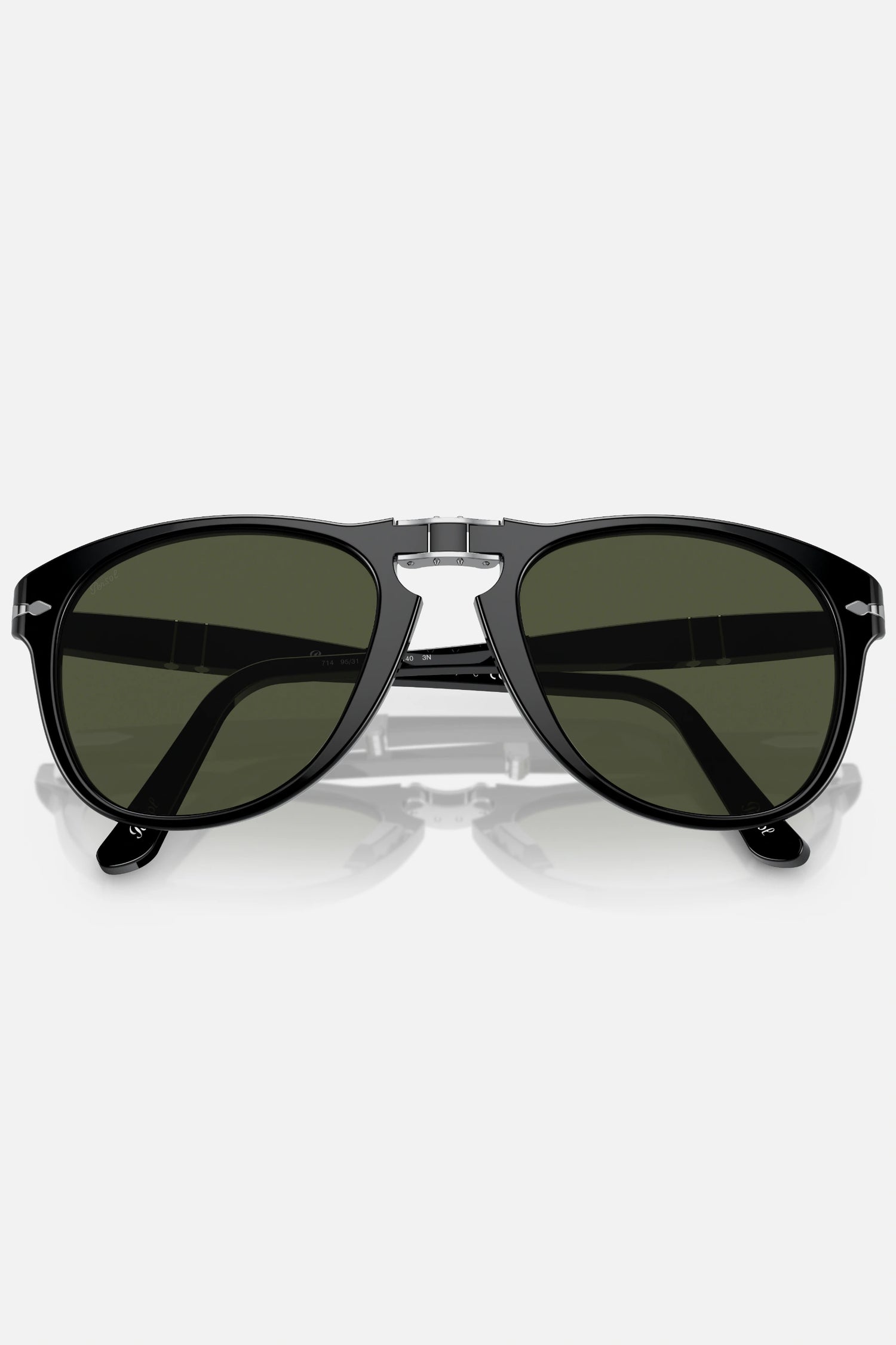 Occhiali da sole Persol PO714 95/31 neri con lenti verdi, modello folding misura 54-21, design vintage italiano.