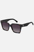 Occhiali da sole Tommy Hilfiger TH 2100/S JBW3X, montatura tartarugato blu con lenti grigio sfumato.