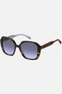 Occhiali da sole Tommy Hilfiger TH 2105/S 086GB, montatura tartarugato con lenti grigio-azzurro sfumato.
