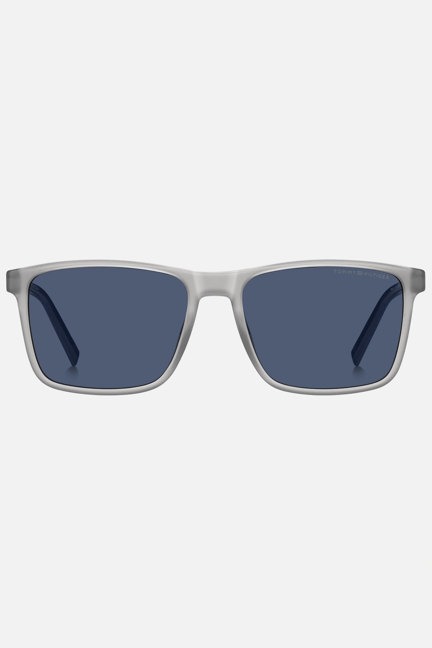 Occhiali da sole Tommy Hilfiger TH 2201/S 09VKU, montatura trasparente opaco con aste blu e lenti blu.