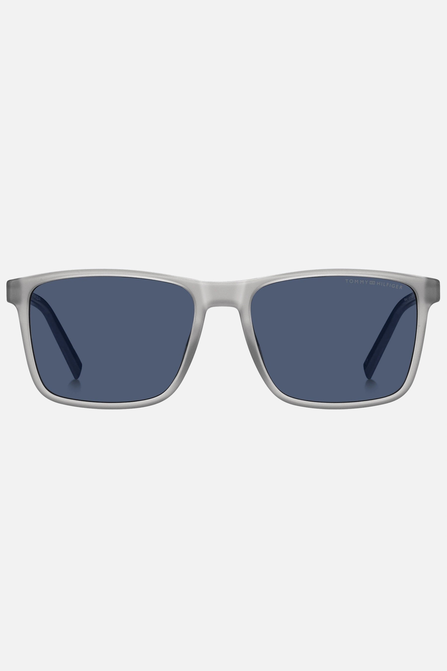 Occhiali da sole Tommy Hilfiger TH 2201/S 09VKU, montatura trasparente opaco con aste blu e lenti blu.